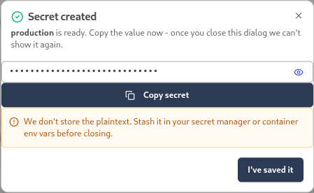 The Secret created dialog showing a masked client secret